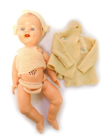 A mid century Roddy plastic baby doll, 50cm high.