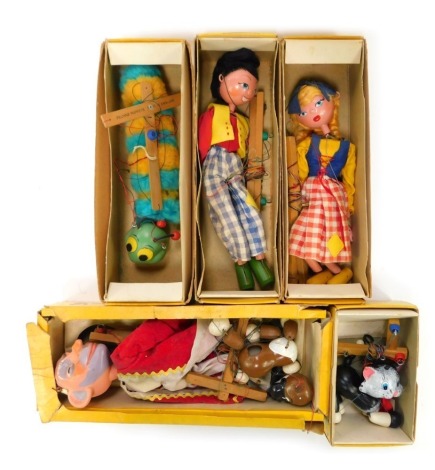 Six Pelham puppets, comprising Cat, Caterpillar, Wizard, Dog, and a girl and boy.