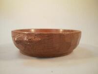 A Robert 'Mouseman' Thompson oak small bowl with carved mouse signature