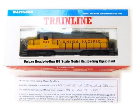 A Trainline OO gauge Walthers 931-102 GP9M UP locomotive, 289, yellow and grey livery, sign written Union Pacific, boxed.