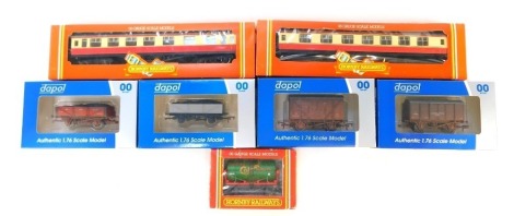 A group of OO gauge rolling stock and coaches, to include two Hornby BR brake third coach, R424, a Hornby R127 Castrol tank wagon, Dapol Hudson Brothers four plank weathered, etc.