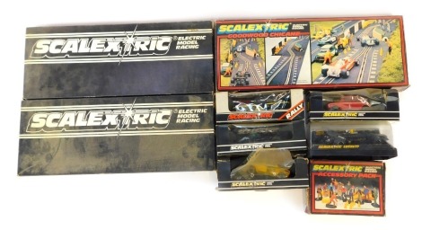 A group of Scalextric cars, to include a C122 Mini 1275GT Rally Special, C052 Ford Escort Mexico special build, a C133 Wolf WR5 F1 car, together with a C177 Goodwood chicane set, a C248 hump bridge, etc. (1 box)