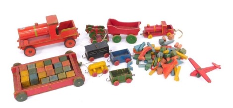 A group of wooden toys, to include a Tri-Ang pull along containing building blocks, wooden train, further building blocks, etc. (1 box)