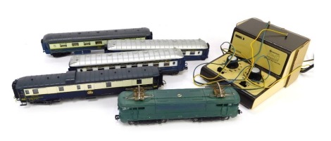 A group of OO gauge model railway, to include a Lima BB9210 locomotive, teal livery, together with four Lima carriages and a Gauge Master Model D Superior electronic model railway transformer controller, boxed.