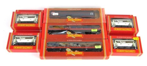 A group of Hornby OO gauge rolling stock, etc, to include Tarmac upper wagon, BGA, R013, Golf 100 tonne tank wagon, R236, car transporter with three cars, R126, etc.