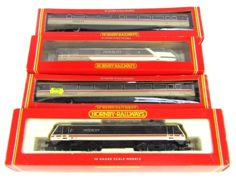 A Hornby OO gauge B0-BO electric Rail Express Class 86 locomotive, 90001, Intercity R22, together with two Intercity coaches, BRMK4 Coach Tourist Open R407 and a BR BO-BO electric 90 locomotive R242.