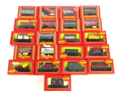 A group of Hornby OO gauge rolling stock, to include milk wagon, goods van, open wagon, Hunting open ore wagon, Hornby 1999, etc. (1 tray)