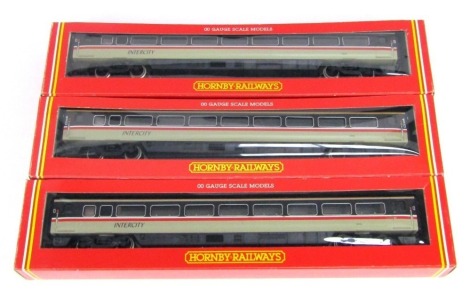 Three Hornby OO gauge coaches, comprising BR MK4 open first coach, R405, R407 and catering service car R408.