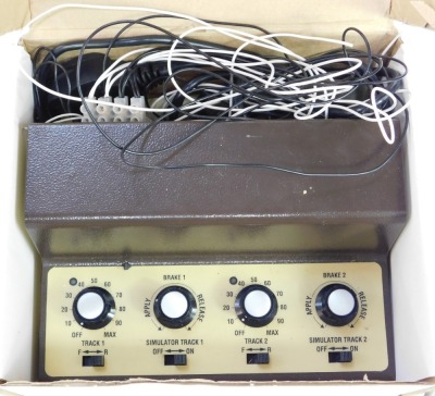 A Gaugemaster model DS electronic model railway transformer controller, together with two Tri-ang power units, etc. - 3