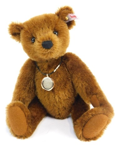 A Steiff brown mohair Teddy bear, The World's First Teddy Bear, exclusive to Danbury Mint, No 1450, 27cm high, boxed with certificate of authenticity.