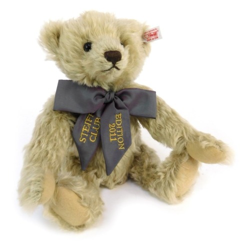 A Steiff Club Annual Edition 2011 Bear, in grey, 30cm high, boxed with certificate.