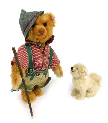 A Steiff mohair Almbirte Teddy Bear with dog, limited edition 438/1500, Teddy Bear 30cm high, dog 13cm high, boxed with certificate. (2)