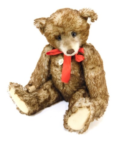 A Steiff mohair Teddy Bear 1926, limited edition 1043/5000, 65cm high, with certificate.