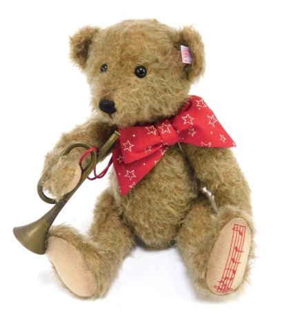 A Steiff mohair musical Anton Teddy Bear, limited edition 404/1225, 35cm high, boxed with certificate.