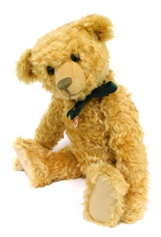 A Steiff mohair Teddy Bear, in caramel with green silk bow, 59cm high, boxed.