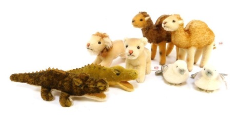 Steiff Noah's Ark mohair Set Four figures, comprising two crocodiles, 18cm and 20cm high, lioness and lion, 13cm and 15cm high, two Dromedary, 14cm and 15cm high, and two Pigeons, 9cm high, with certificate and single box.