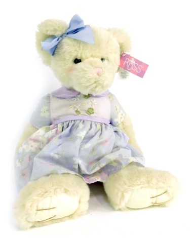 A Russ Sweet Blossoms Fiona Teddy Bear, in lilac floral dress.