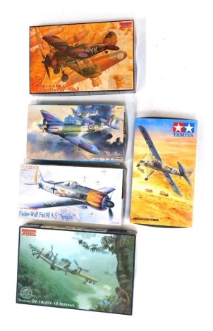 Five model aircraft kits 1:48 scale, comprising Roden Grumman OV-1A JOV-1A Mohawk, Roden Gloucester Gladiator MkI, Dragon Focke-Wulf FW190A5 Special, Hasegawa Spitfire MkIXc, and Tamiya Fieseler Fi156C Storch, boxed. (5)