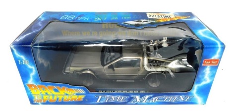 A Sunstar 1:18 scale Back to the Future DeLorean, boxed.