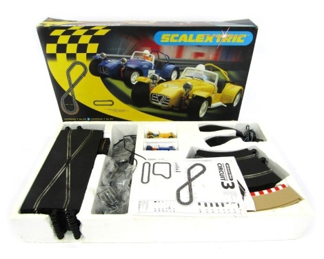 Scalextric Caterham Cup slot car set, including Caterham 7 No 98 and Caterham 7 No 99, boxed.