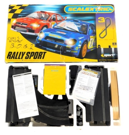 Scalextric Rally Sport slot car set, to include Subaru Imprezza WRC No 10 and Mitsubishi Evo 7 WRC No 8, boxed.