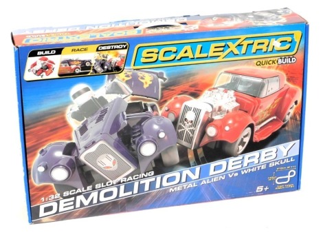 A Scalextric Quick Build Demolition Derby set, to include Metal Alien vs White Skull, boxed.