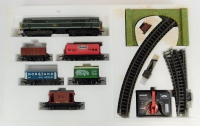 A Hornby Railways OO gauge Freight Master electric train set, including locomotive, rolling stock, oval track layout, shunting siding, tunnel and uncoupling ramp, and transformer. - 2