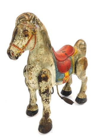 A 1940's Mobo tinplate ride on horse.