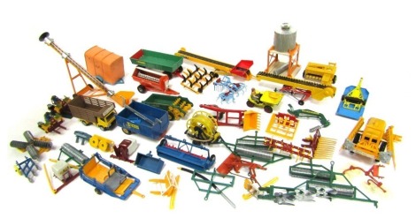 Britains Dinky and other farming implements, including Corgi freights dumper, ploughs, seed drills, grain elevator, etc. (2 trays)