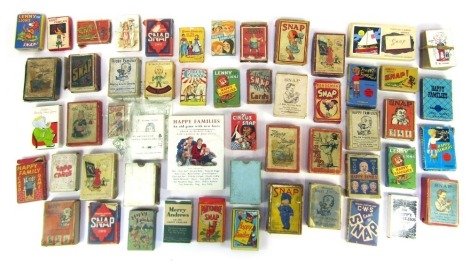 Various Snap and Happy Families playing cards, including Merry Andrews, English and Scottish joint game of Snap, Lenny Lions Snap, Happy Families of the World, Nursery Rhyme Snap, etc. (2 trays)