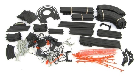 Micro Scalextric and Aurora track and accessories, controllers, etc. (1 box)