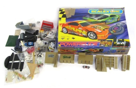 Scalextric accessories, including Scalextric power track, spare wheels, incomplete Scalextric power slide set, etc. (2 boxes)