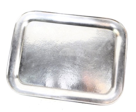 A London and North Eastern Railway stainless steel tray, of rectangular form with rounded corners, hammered central panel engraved LNER, 40cm x 30cm.