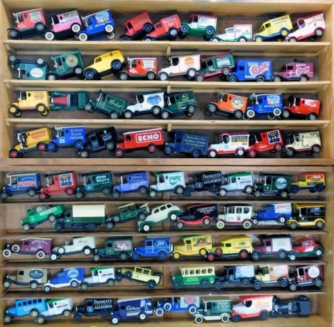 Two wooden collectors car shelves, to include a collection of Models of Yesteryear, Oxford diecast and others, advertising trucks, etc. (2 cabinets)