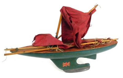 A model pond yacht, painted in green with striped and ribbed body, numbered 771594. - 3