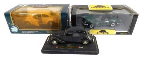 1-18 scale diecast vehicles, comprising Burago Citroen 15CVTA 1938, a Road Tuff Volkswagen Beetle 1967, and a Chrono Triumph Spitfire, two boxed. (3)