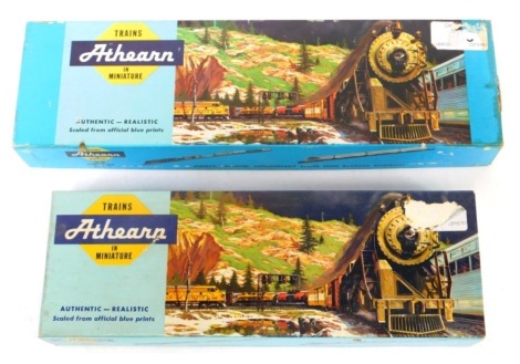 Two Atheana train sets, comprising The Authentic Miniature Milwaukee Road tender, in yellow, boxed, and The Union Pacific 70, boxed. (2)