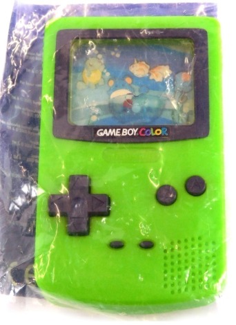 A Burger King Gameboy Colour, and Pokemon insert mini game, in green.