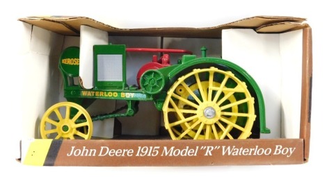 An Ertl John Deere 1950 model R Waterloo Boy tractor, boxed.