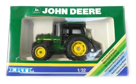 An Ertl John Deere 1:32 scale diecast model, boxed.