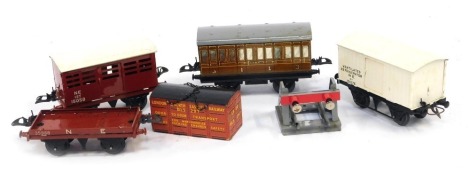 Five Hornby Railways O gauge rolling stock, comprising number 1 cattle truck, flat truck with container, wagon Frigorifiqe number 1, number 1 passenger coach, and a number 1 buffer stop, boxed. (5)