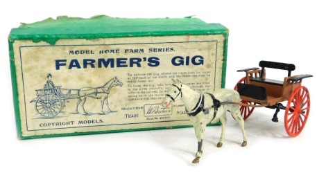 A Britain's model home Farm Series Farmers Gig, number 20F, boxed.