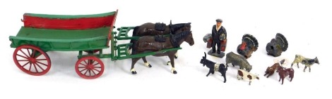 A Britain's diecast model cart, in green with two pull horses, small group of farm animals and figures. (1 box)