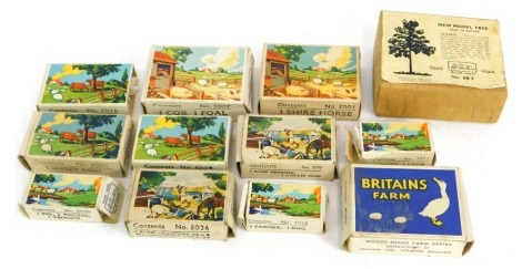 A group of Britain's boxed farm animals and vehicles, to include a new model tree number 58F, one farmers wife three fowls number 5029, one cob on fowl number 5007, one pig two piglets one trough number 5030, one Jersey cow 5020, two aged villagers 5026, 