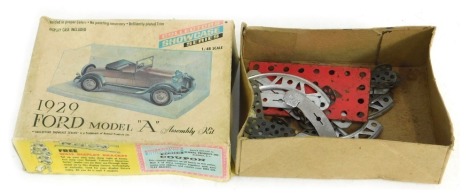 A box of loose meccano.