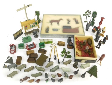 A group of playworn lead figures, Castrol advertisers, farm animals, cased farrier set, etc. (1 tray)