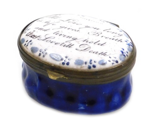 A late 18thC Bilston enamel patch box, of oval form, decorated to the lid with "I'll Love you long as life gives. Breath and living hold that Love till Death", within a floral border, on a white ground, the box in cobalt blue, 40mm wide.