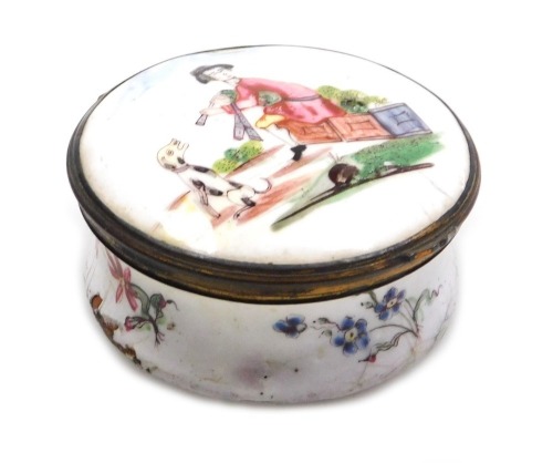 A late 18thC Continental enamel snuff box, possibly French, of cylindrical form, decorated to the lid with a man playing bagpipes, and a seated hound, the box with floral sprays, all on a white ground, 55mm diameter. (AF)