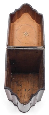 A George III serpentine mahogany knife box, with cross banding, the hinged lid with star burst paterae, opening to reveal a vacant interior, 34.5cm high, 22cm wide. - 3