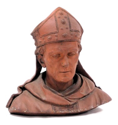 A late 19thC French terracotta bust of a bishop, robed and wearing a mitre, 37.5cm high.